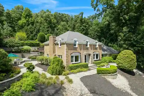 Elegant Colonial on 5 Acres with Pool