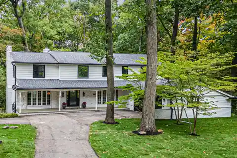 Spacious Family Home with Dual Fireplaces and Modern Kitchen