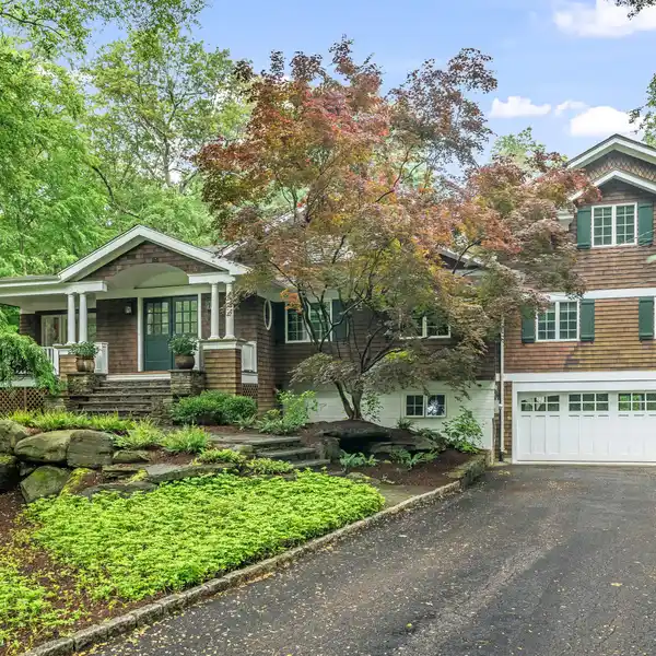 BEAUTIFULLY EXPANDED AND METICULOUSLY MAINTAINED RESIDENCE