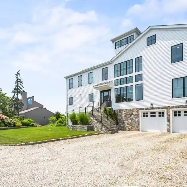 ULTIMATE BLEND OF WATERFRONT LIVING AND LUXURIOUS COASTAL DESIGN