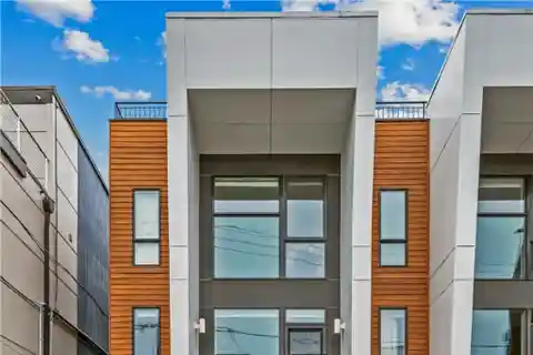 Entertain in Style with Two Rooftop Decks