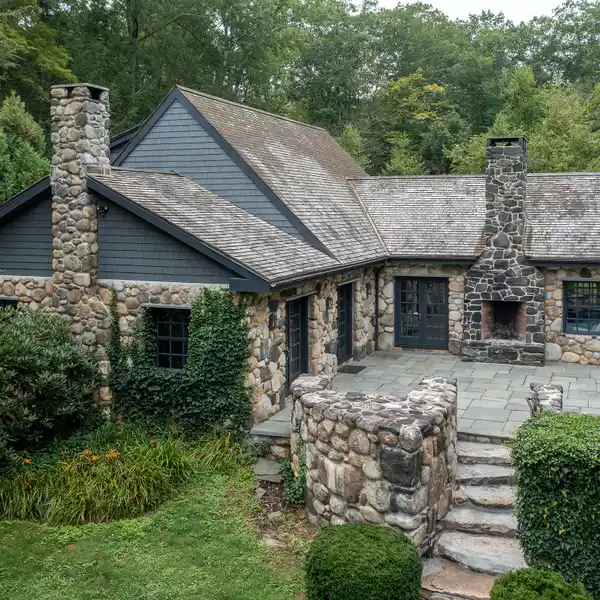 STORYBOOK STONE COTTAGE WITH 2000 FEET OF FRONTAGE