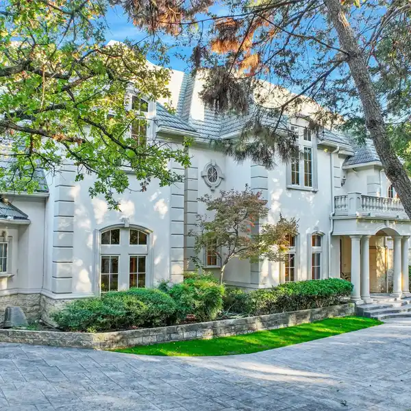 EXQUISITE ESTATE ON A TREED LOT
