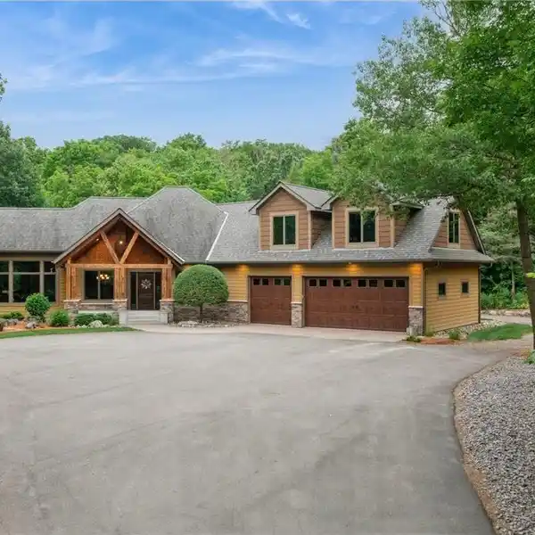 PEACEFUL LIVING ON A WOODED 8.85-ACRE LOT