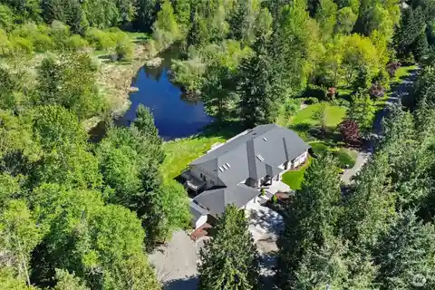 Private Estate on 7.5 Acres with Spring Fed Lake