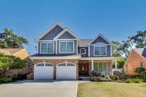 Four-Level Elegance with Designer Finishes Throughout