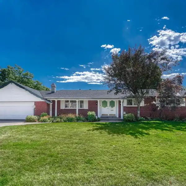 MID-CENTURY CUSTOM HOME ON A PREMIER LAKEFRONT LOT