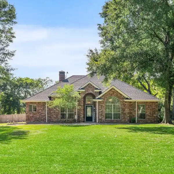 RARE WATERFRONT ACREAGE WITH OPEN LAYOUT HOME