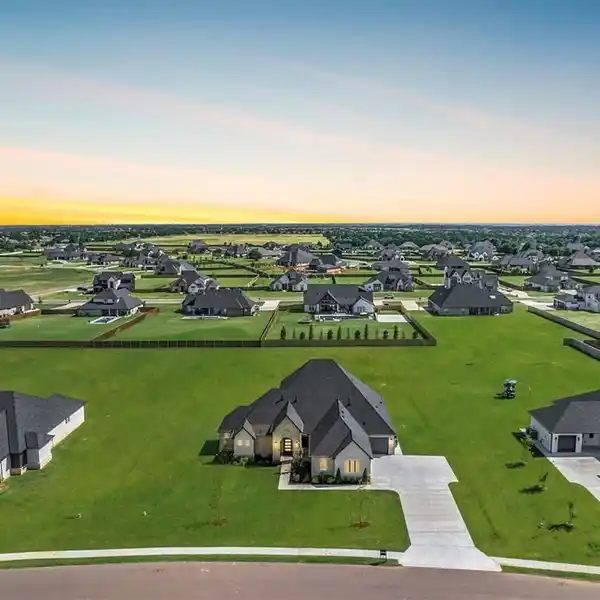 EXPERIENCE SOPHISTICATED LIVING IN THIS GATED ADDINGTON FARMS RETREAT