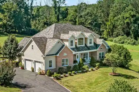 Builder’s Private 7-Acre Custom Estate