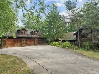 Unique Log Cabin on Wooded Property