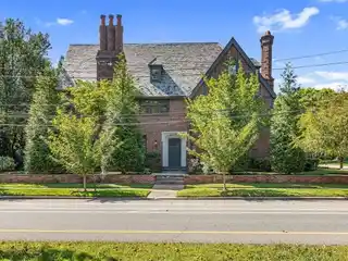 Handsome Brick Tudor Revival Style Home