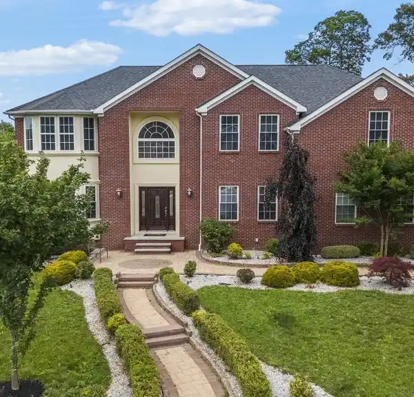 STUNNING BRICK-FRONT COLONIAL IN HIGHLY DESIRABLE AREA