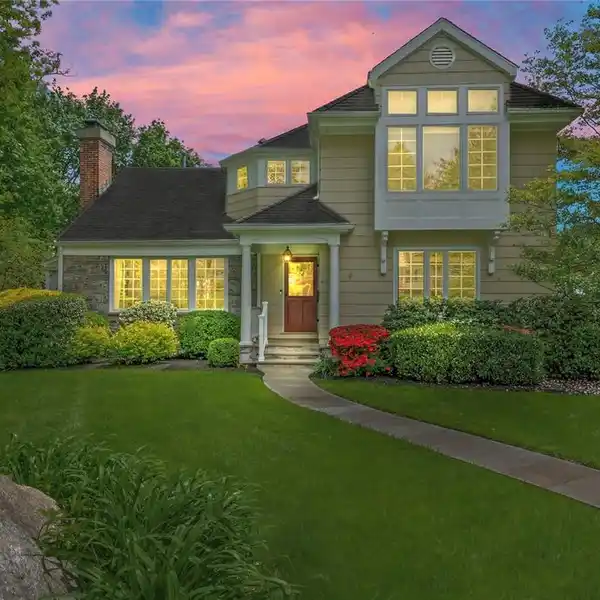 RARE LARCHMONT COLONIAL ON EXPANSIVE PRIVATE LOT