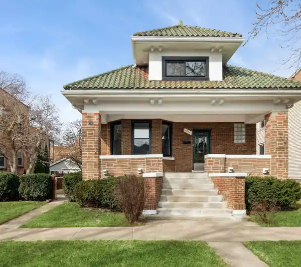 SPACIOUS BRICK HOME IN PRIME LOCATION
