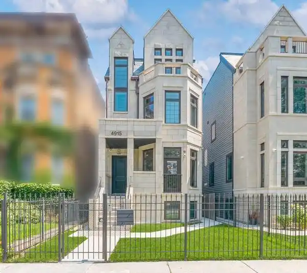 CUSTOM LIGHT-FILLED MANSION IN ICONIC BRONZEVILLE