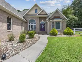 All-Brick Beauty Backing to Scenic Cypress Creek