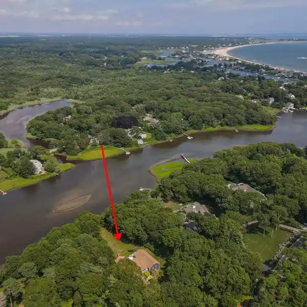 TRANQUIL AND CHARMING ACREAGE ON PRIME RIVER WATERFRONT
