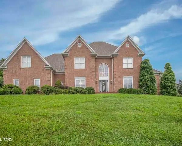 STATELY ALL-BRICK HOME ON A PROMINENT CORNER