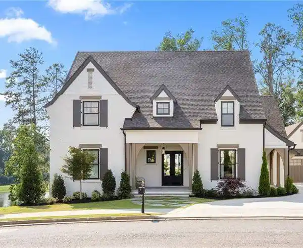 CHARMING BRICK HOME OVERLOOKING A SPRING-FED POND