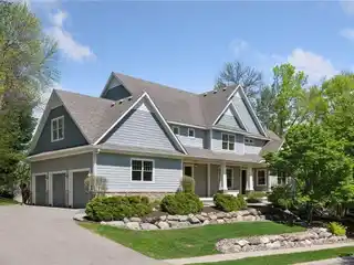 Beautifully Maintained Custom Home