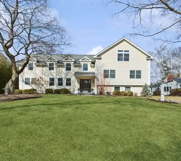 CUSTOM HOME ON A PICTURESQUE LOT IN ROLLING HILL
