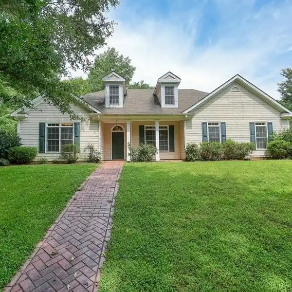CUSTOM RANCH HOME ON OVER TEN ACRES