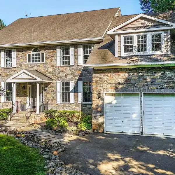 LUXURIOUS STONE-FRONT HOME WITH OUTDOOR OASIS