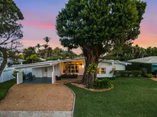 Mid-century Coastal Retreat on a Prime Interior Lot