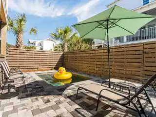 Turnkey Beach Home with Designer Finishes and Bunk Room for Guests