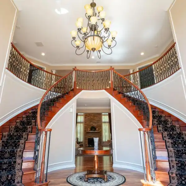 GRAND CUSTOM-DESIGNED ESTATE IN A COVETED NEIGHBORHOOD