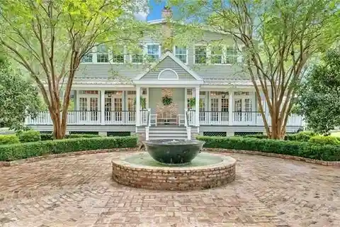Craftsmanship and Charm on Expansive Oak-Spotted Estate