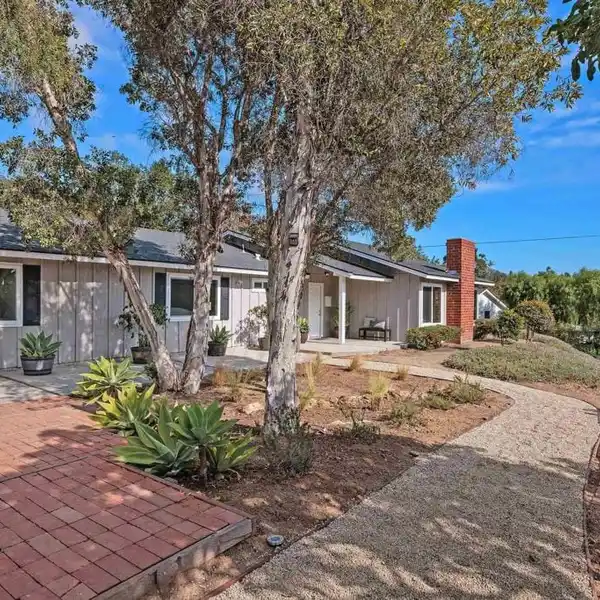 SPACIOUS COASTAL RETREAT WITH MODERN UPDATES AND PRIVACY