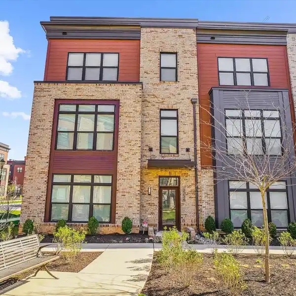 SLEEK FOUR-LEVEL TOWNHOME WITH DESIGNER FINISHES