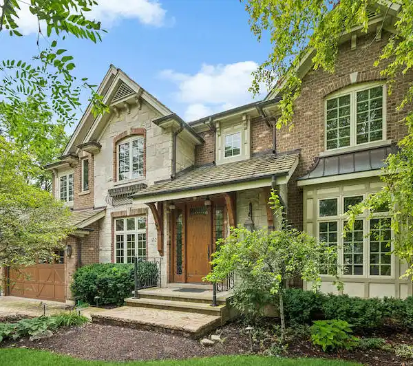 CUSTOM HOME IN COVETED GLEN OAK ACRES