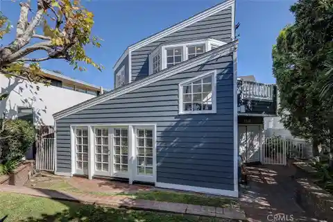 Sunlit Coastal Haven with Designer Touches