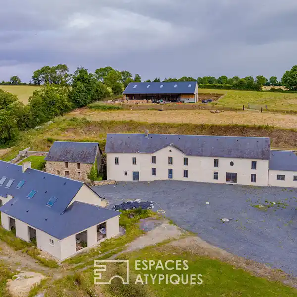 GREAT COMPOUND INCLUDING A RENOVATED GRAIN MILL