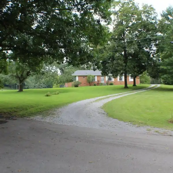 PEACEFUL QUIET FARM WITH ALL BRICK HOME AND HISTORIC BARN
