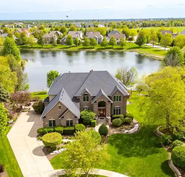 EXCEPTIONAL ALL-BRICK CUSTOM HOME IN TAMARACK WEST
