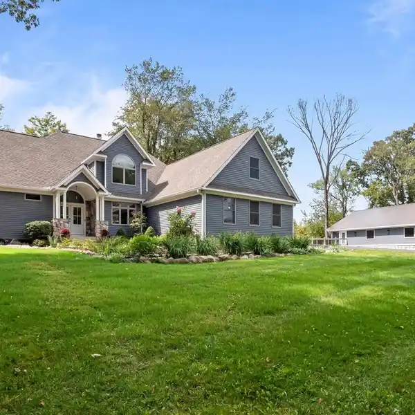 EXQUISITE HOME WITH HEATED MEGA BARN