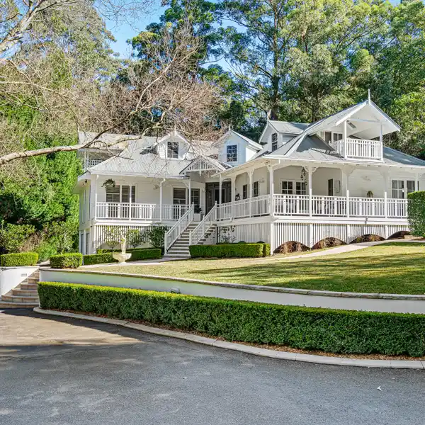 CAPTIVATING HOME AMID ESTATE-LIKE GARDENS