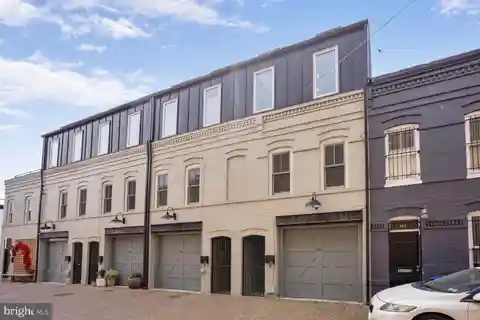 Sleek Sanctuary with Rooftop and Garden Escape