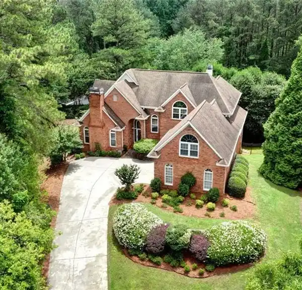 ELEGANT ALL-BRICK ESTATE IN PRESTIGIOUS ST. IVES COUNTRY CLUB
