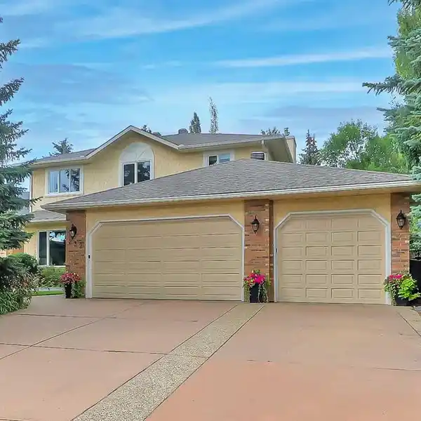 RENOVATED ESTATE ON OVERSIZED LOT WITH TRIPLE GARAGE