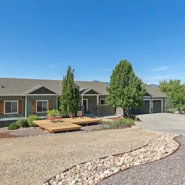 VAULTED MOUNTAIN-VIEW HOME WITH WALK-OUT BASEMENT