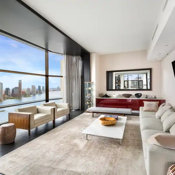LUXURIOUS CUSTOM DESIGNED THREE BEDROOM CONDO WITH SWEEPING VIEWS
