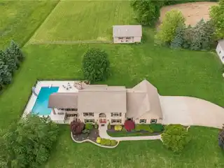 Stunning Brick Homestead with Horse Barn