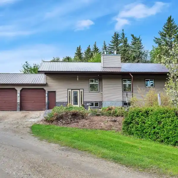 BEAUTIFULLY UPDATED 10-ACRE PROPERTY