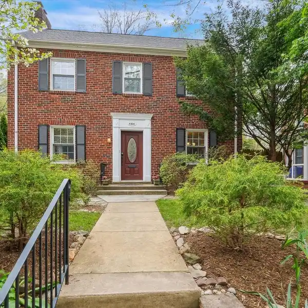 CLASSIC CENTER HALL COLONIAL WITH DETACHED STUDIO
