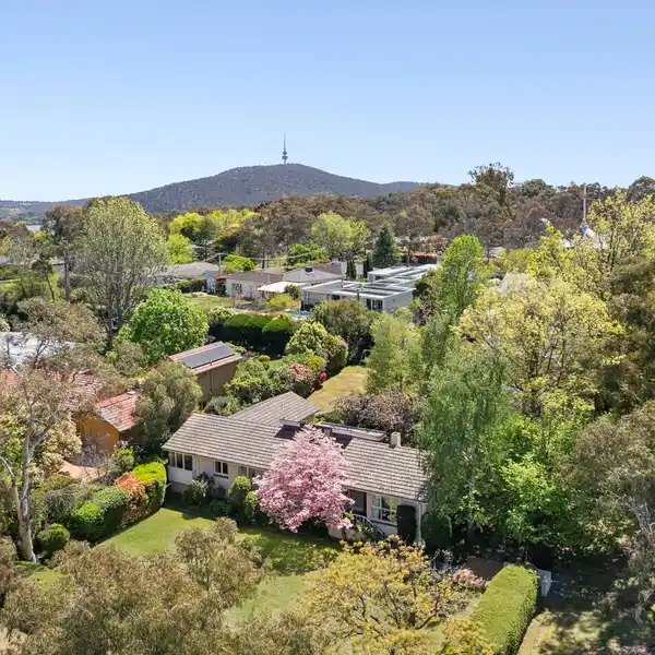 EXPANSIVE MID-CENTURY CHARACTER ESTATE WITH TIMELESS ELEGANCE